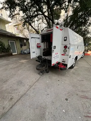 Magnet Plumbing service vehicle on-site for Grease Trap Cleaning in Salt Creek
